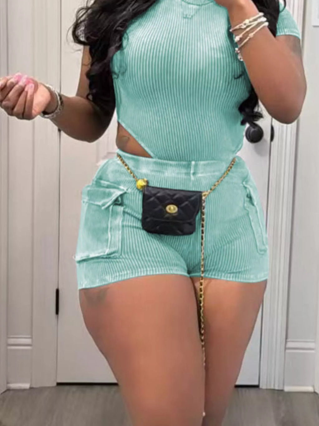 Ribbed knit bodysuit and shorts set by Shopimist, featuring a fitted design with ribbed texture and casual style.
