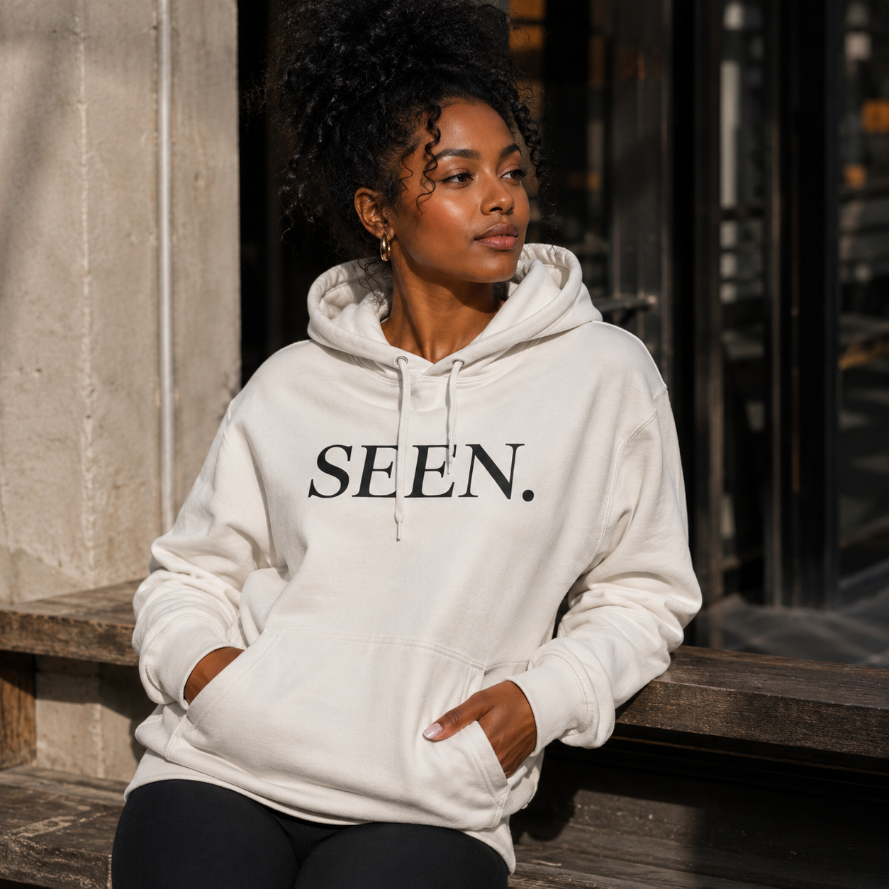 Black Ink Edition SEEN. Hoodie by Wear Your Worship, featuring a comfortable fit and bold design in black fabric.
