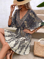 Paisley print batwing sleeve tassel tie front ruffle hem dress by FitiqueFit, casualwear with flowing sleeves and boho style.
