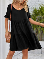 Lightweight rayon ruffled sleeve tiered mini dress with pockets, stylish and comfortable, perfect for casual wear.