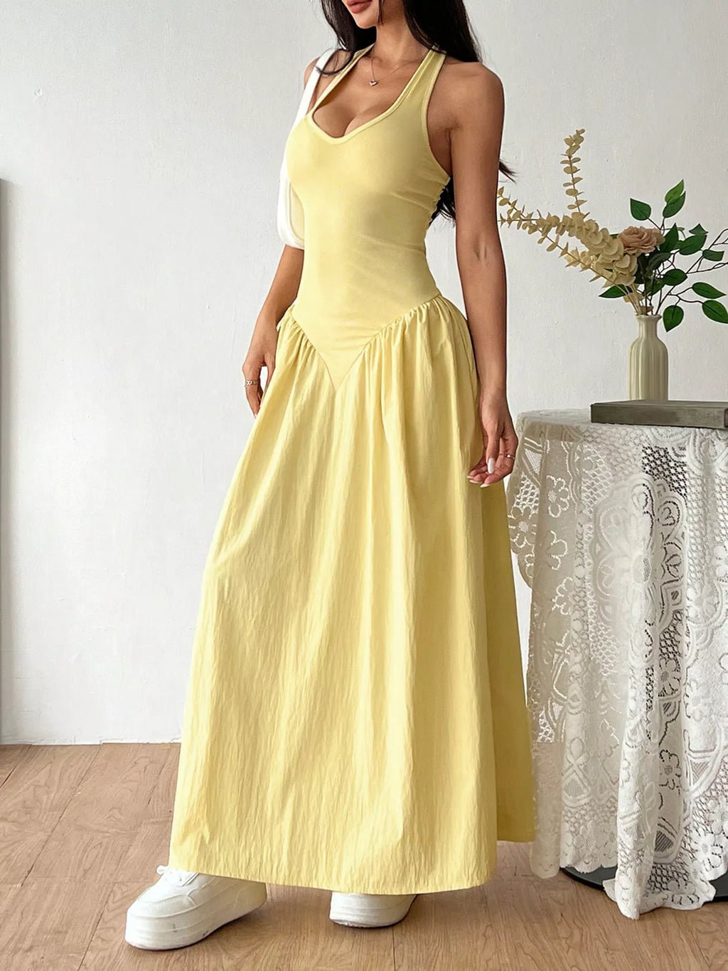 Halter neck ruched maxi dress by Shopimist featuring a flowing silhouette and elegant design, perfect for formal or summer occasions.