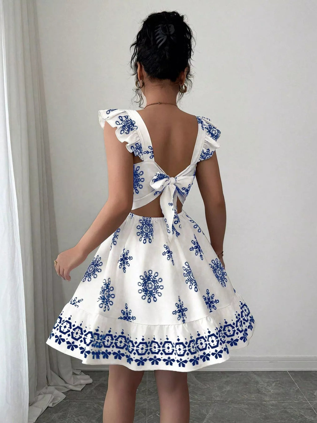 Printed Bow Back Square Neck Mini Dress from Shopimist, featuring a square neckline, bow back detail, and a stylish mini length.