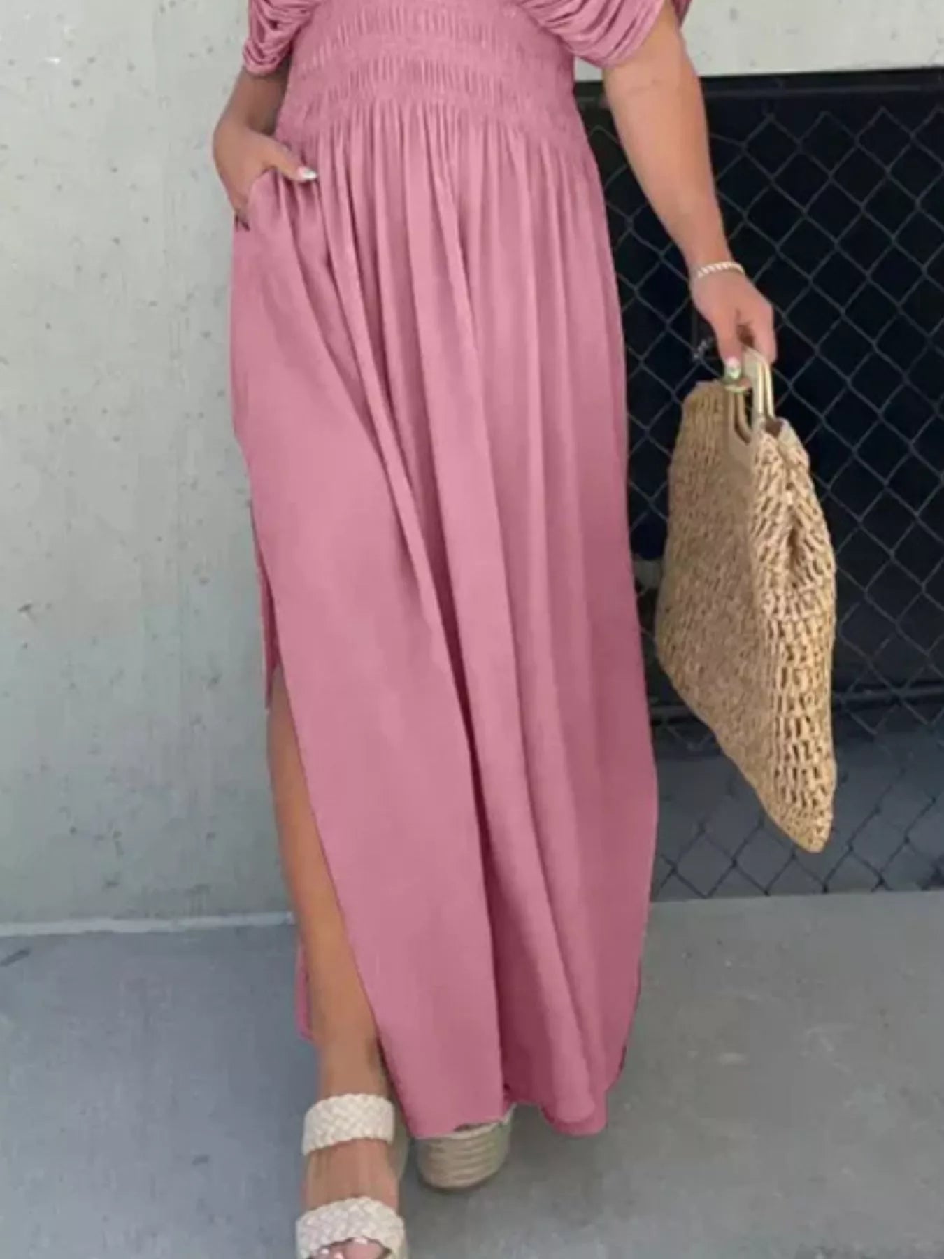 Plus size maxi dress with slit V-neck and smocked waist by Trendsi, featuring flowing fabric and a stylish, elegant design.