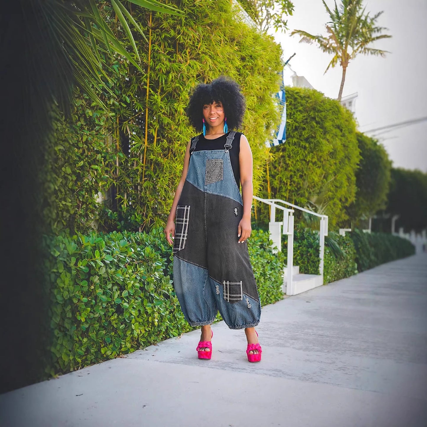 Ripped patchwork high-waisted denim overalls by Plush Fashion Hub with distressed details and adjustable straps.
