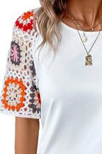 Plush Fashion Hub geometric print round neck short sleeve blouse, stylish tops with modern pattern and comfortable fit.
