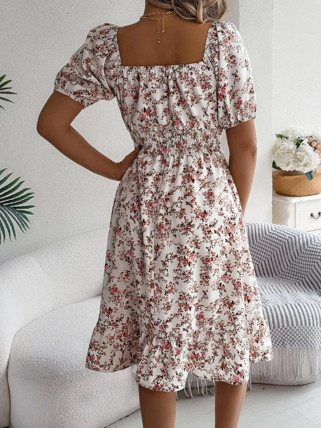 Shopimist floral puff sleeve dress with ruffled hem, featuring a feminine fit and vibrant floral pattern on lightweight fabric.