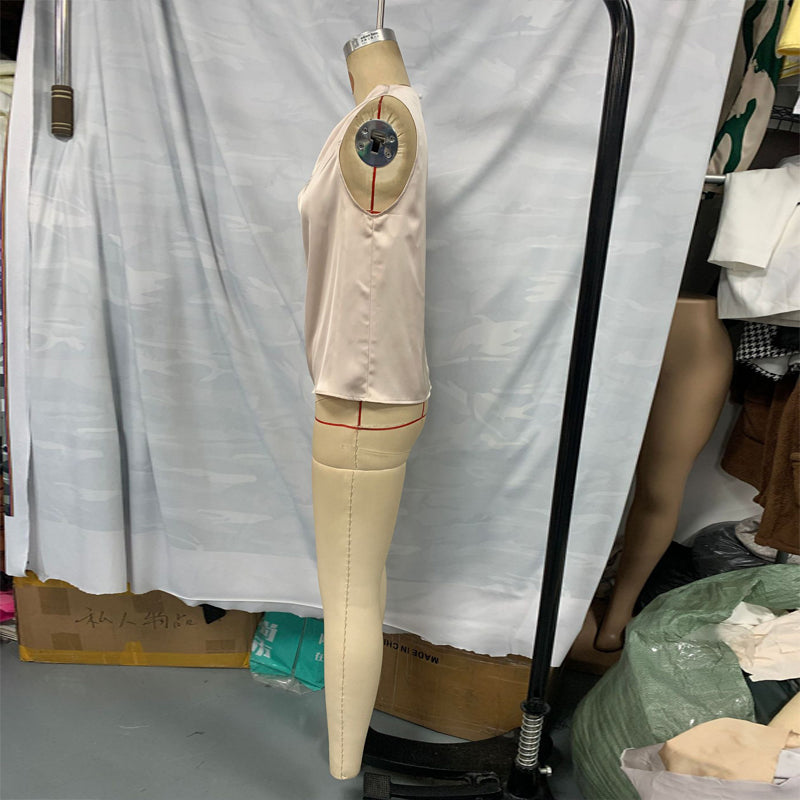 Women's elegant sleeveless mock neck top by FitiqueFit, casualwear style, shown in a neutral color on a plain background.