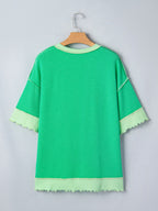 Women's ribbed twist hem short sleeve T-shirt with contrast stitching, featuring a fitted design and stylish neckline.