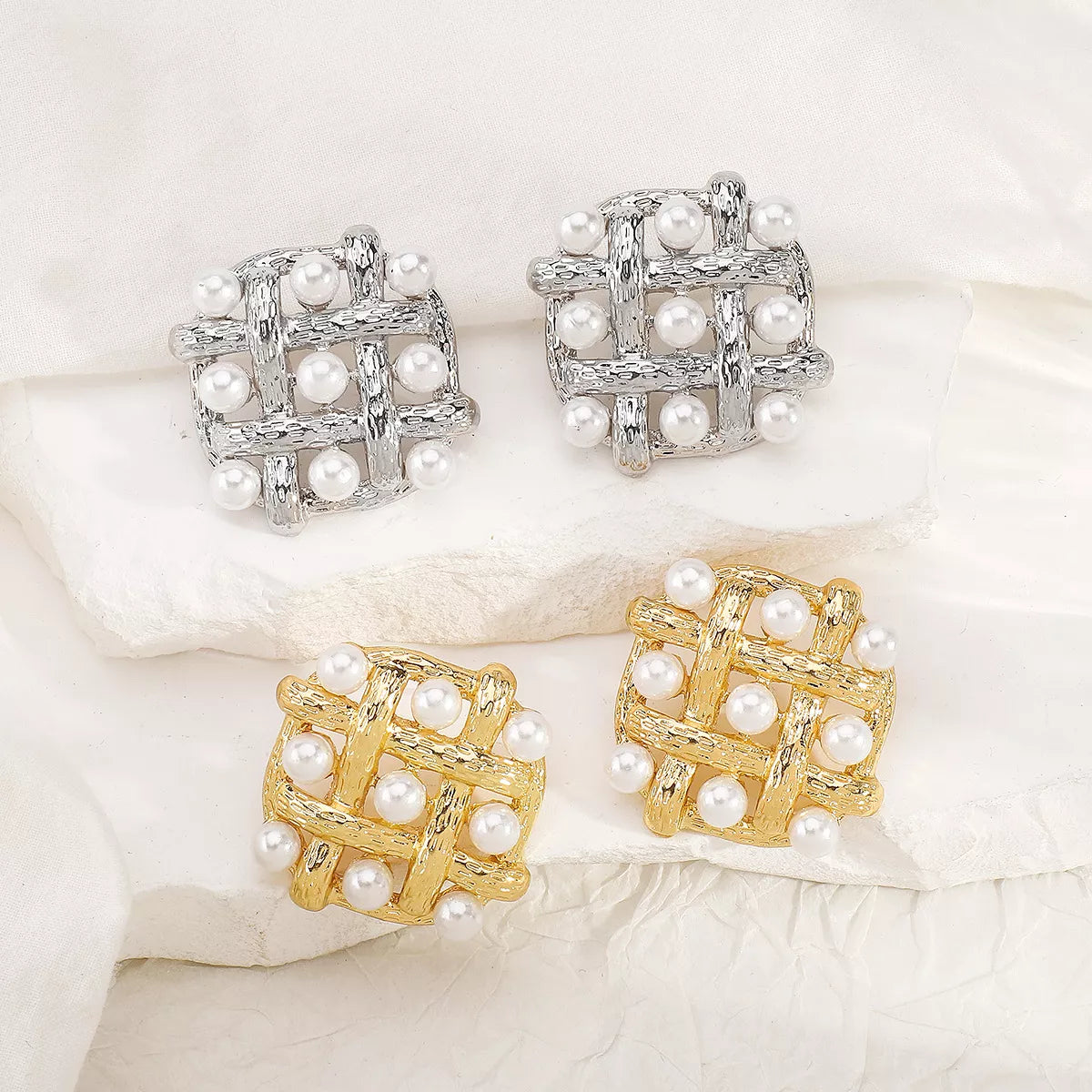 Pearl grid square stud earrings by Plush Fashion Hub featuring elegant white pearls on a silver square design.