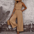 Women’s sleeveless vest and casual pants two-piece set by Plush Fashion Hub, featuring a draped neck design and relaxed fit.