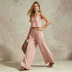 Women's sleeveless V-neck camisole top and wide-leg pants matching set by FitiqueFit, shown in a stylish and comfortable design.