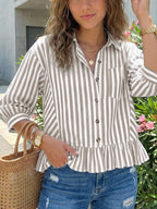 Women's striped button-down blouse with ruffled hem, lightweight viscose fabric, casual style, featuring vertical stripes and a relaxed fit.