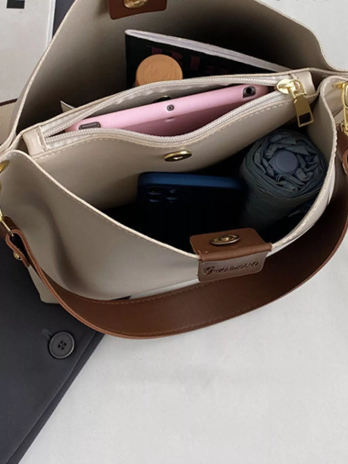 Plush Fashion Hub PU leather crossbody handbag with adjustable strap and sleek design, perfect for daily use and stylish outings.