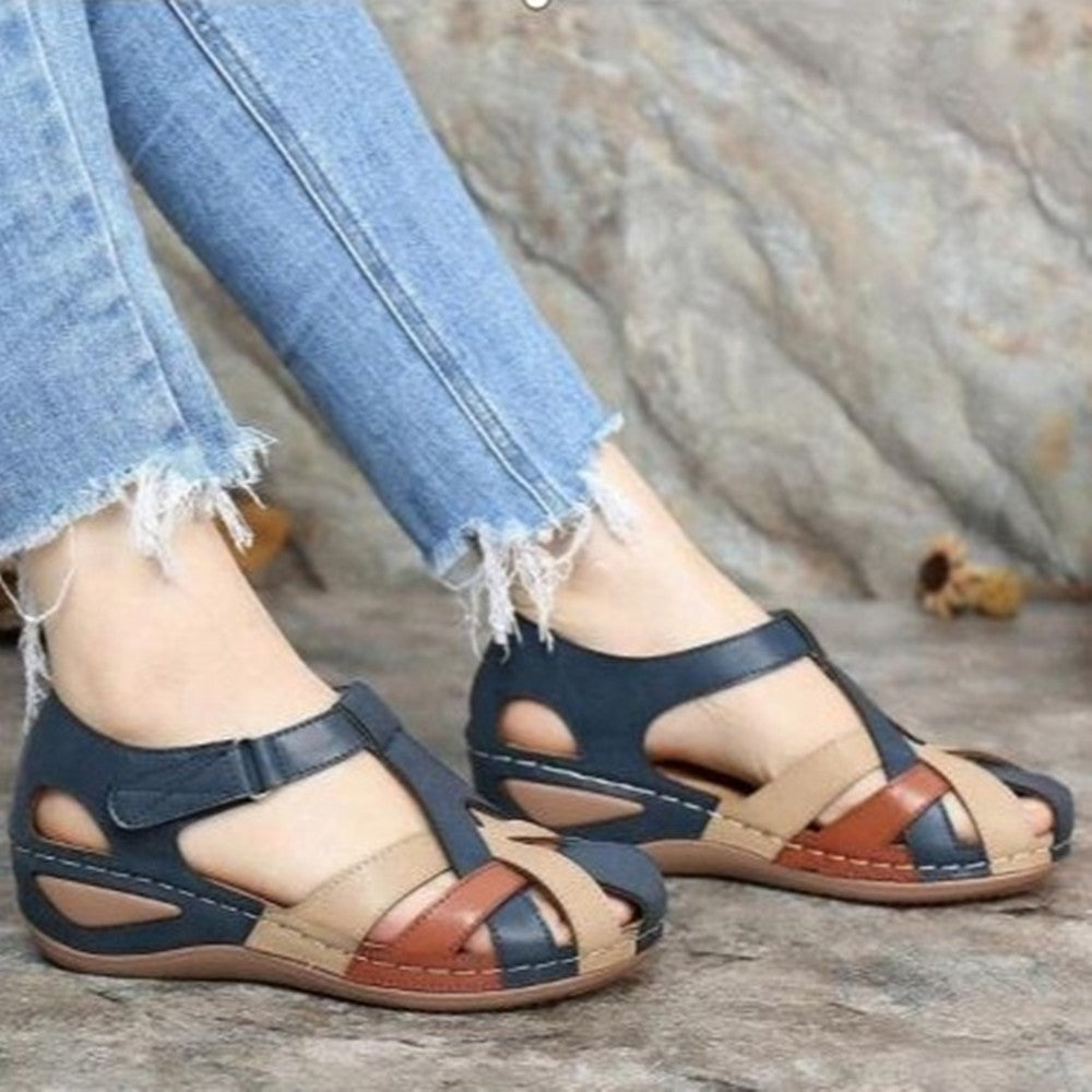 Vintage round toe wedge sandals for ladies with cross buckle detail from Plush Fashion Hub, stylish and comfortable summer footwear.