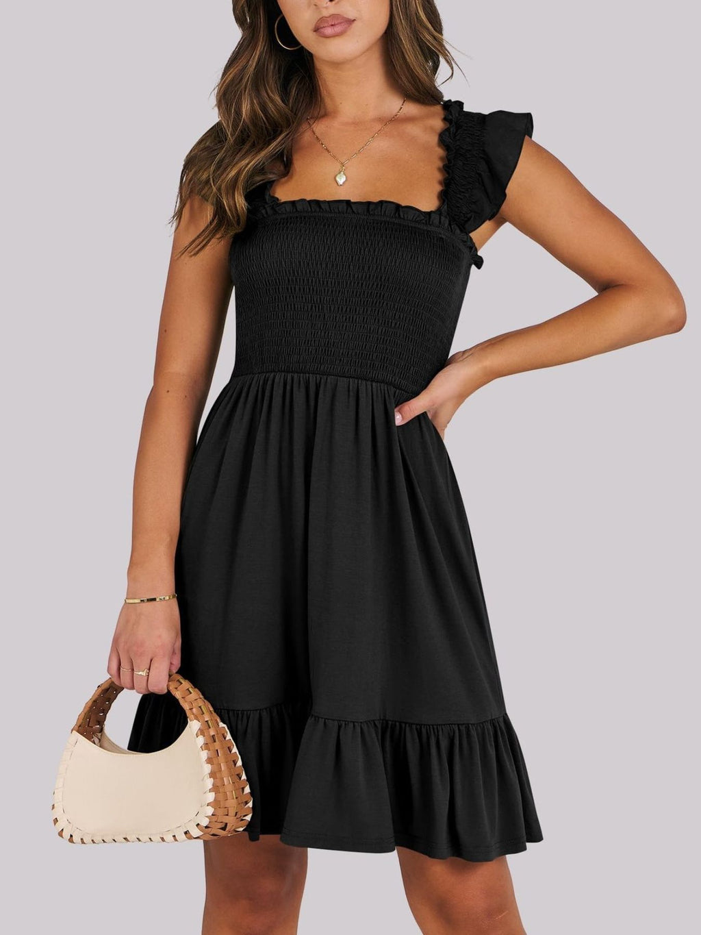Women's lightweight smocked ruffle hem mini dress by Trendsi, casual summer dress with breezy design and ruffle details.