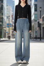 Casualwear Plush Fashion Hub retro loose straight-leg high-waist maternity jeans with floor-length wide legs, displayed on a model.