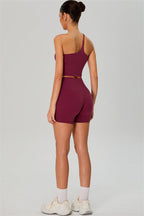 Fitglutes activewear one-shoulder crop top and shorts 2-piece set, stylish gym and workout sportswear for women.