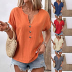 Women's buttoned V-neck short-sleeve T-shirt top by Plush Fashion Hub, shown in a casual fit with front buttons and soft fabric.