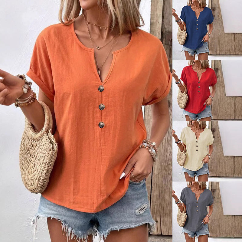 Women's buttoned V-neck short-sleeve T-shirt top by Plush Fashion Hub, shown in a casual fit with front buttons and soft fabric.