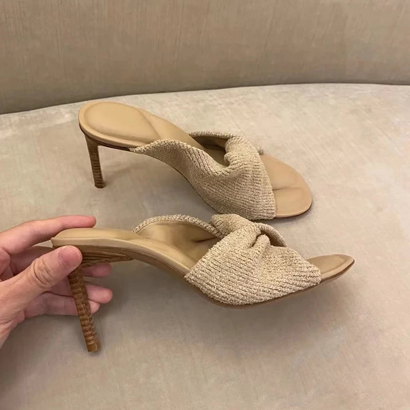 Plush Fashion Hub elegant stiletto heels with bow accents, featuring a sleek design and open-toe style, perfect for formal occasions.