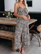 Full size Shopimist tie-dye wide leg jumpsuit, plus size, featuring vibrant colors and relaxed fit, on a plain background.
