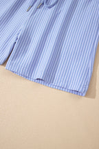 Lilian Dolman Sleeve Polo Shirt Set by Threaded Pear featuring a short sleeve polo top and matching shorts in a casual style.