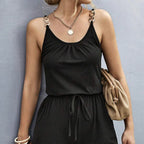 Women’s casual chain detail suspender jumpsuit by Plush Fashion Hub, featuring a stylish design with suspenders and chain accents.