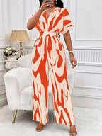 Abstract print wide-leg jumpsuit from Trendsi featuring a relaxed fit and bold, artistic design, perfect for stylish casual wear.