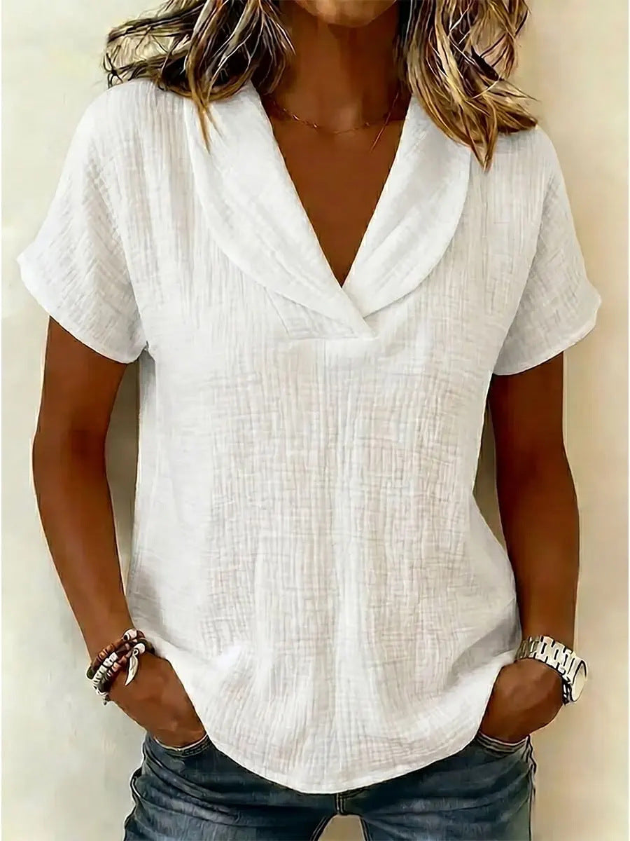 Women's knitted short-sleeve butterfly collar top from Plush Fashion Hub, featuring a casual fit and stylish butterfly neckline.