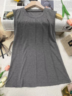 White round neck tank top from Trendsi featuring a sleeveless design and soft, breathable fabric.