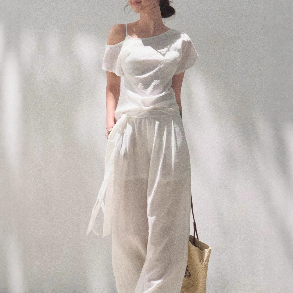 Linen off-shoulder asymmetric casual set by FitiqueFit in two colors, featuring relaxed fit and stylish design for everyday wear.