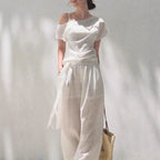 Linen off-shoulder asymmetric casual set by FitiqueFit in two colors, featuring relaxed fit and stylish design for everyday wear.