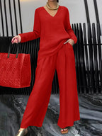 Solid color long sleeve top and pants two-piece travel set by Plush Fashion Hub, comfortable casual outfit for travel or lounging.