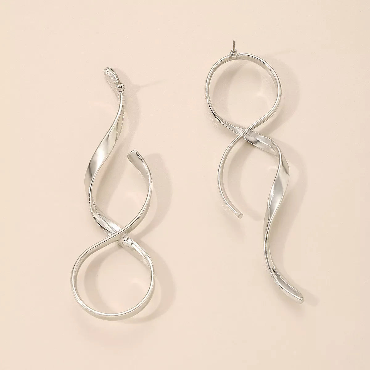 Shopimist alloy spiral drop earrings featuring sleek, twisting metal design hanging from fishhook ear wires.