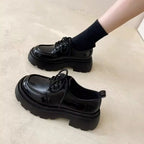Women’s British style chunky sole leather loafers with elevated heel, trendy FitiqueFit footwear, shown with stylish design details.