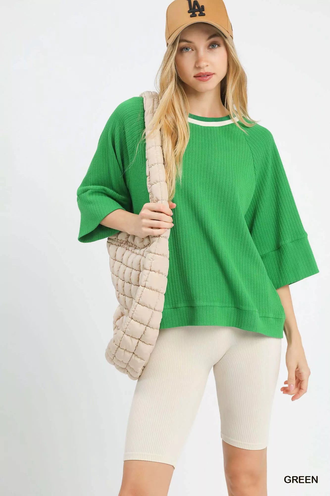 Umgee ribbed knit top with contrast trim, featuring long sleeves and a fitted design, stylish and comfortable for casual wear.
