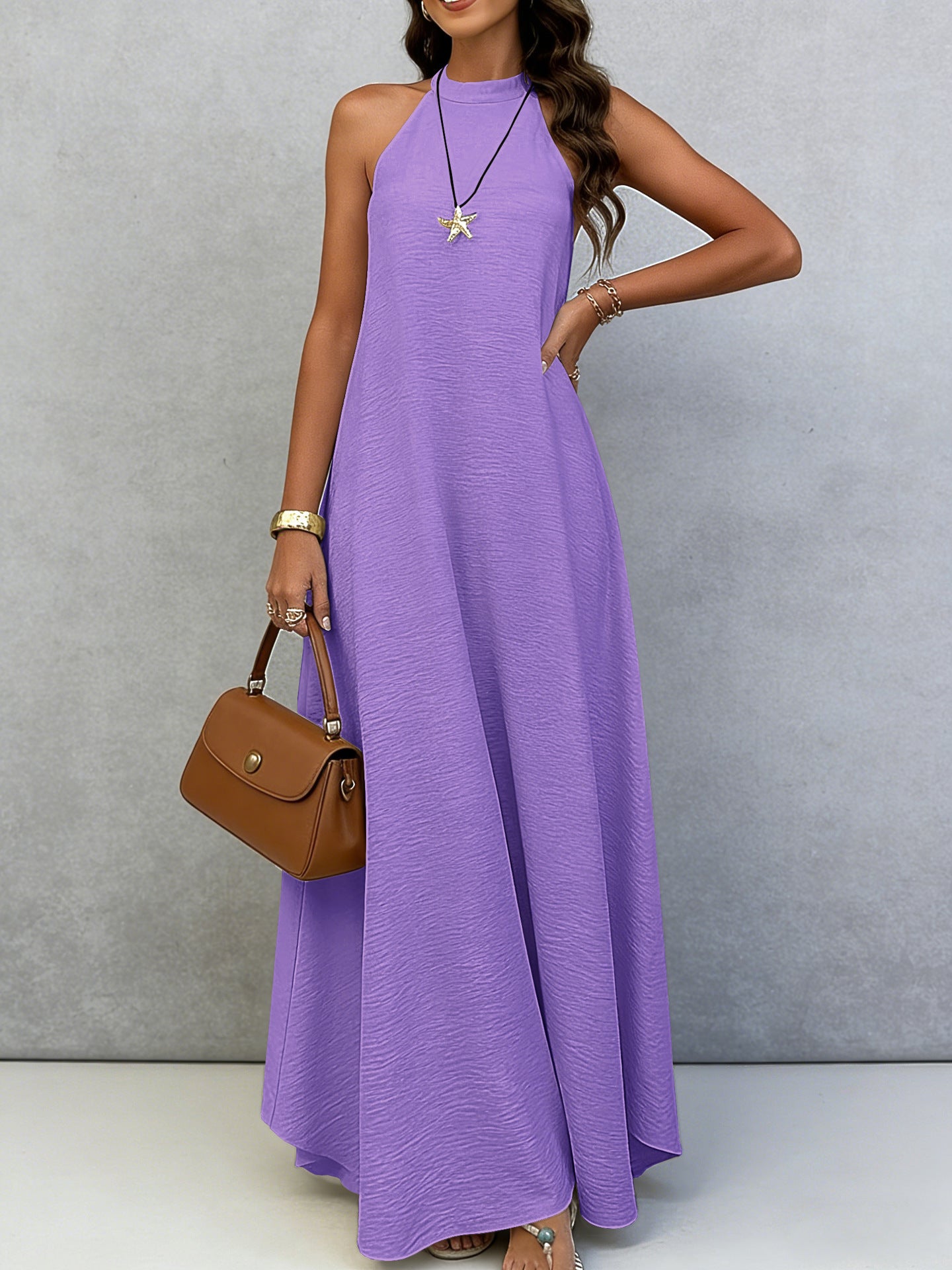 Women's Ice Silk Crinkle Sleeveless Swing Maxi Dress in casualwear style, featuring lightweight, flowy fabric and a relaxed fit.