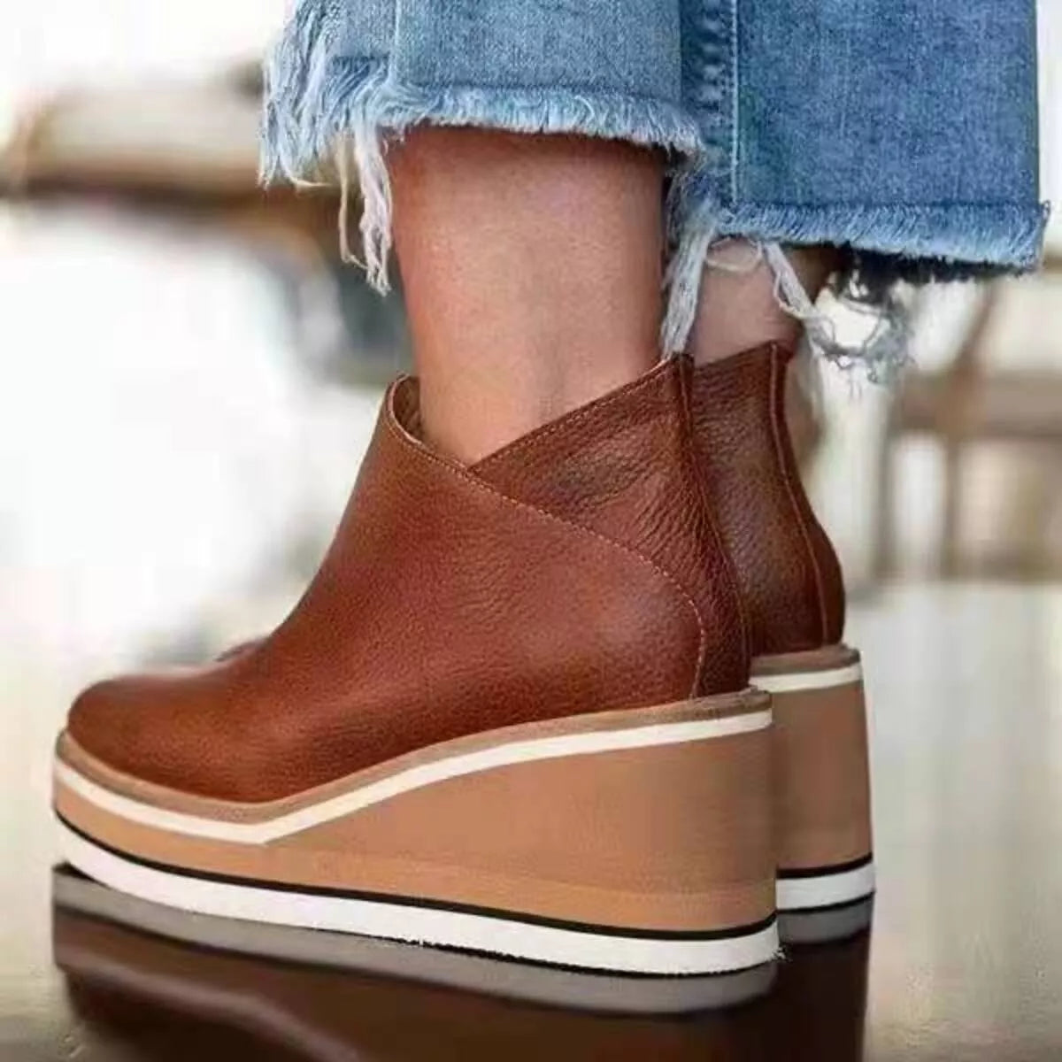 Women's ankle wedge boots with zipper, trendy Trendsi shoes featuring a stylish design and comfortable wedge heel.