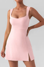 Square neck sleeveless slit mini active dress by Trendsi, shown in black with a fitted silhouette and athletic design.