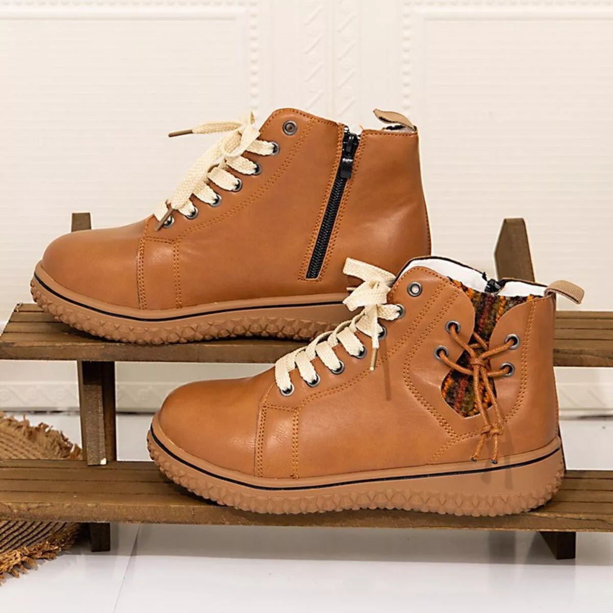 Women's round toe platform ankle boots by Trendsi featuring a sleek design and sturdy heel for stylish everyday wear.