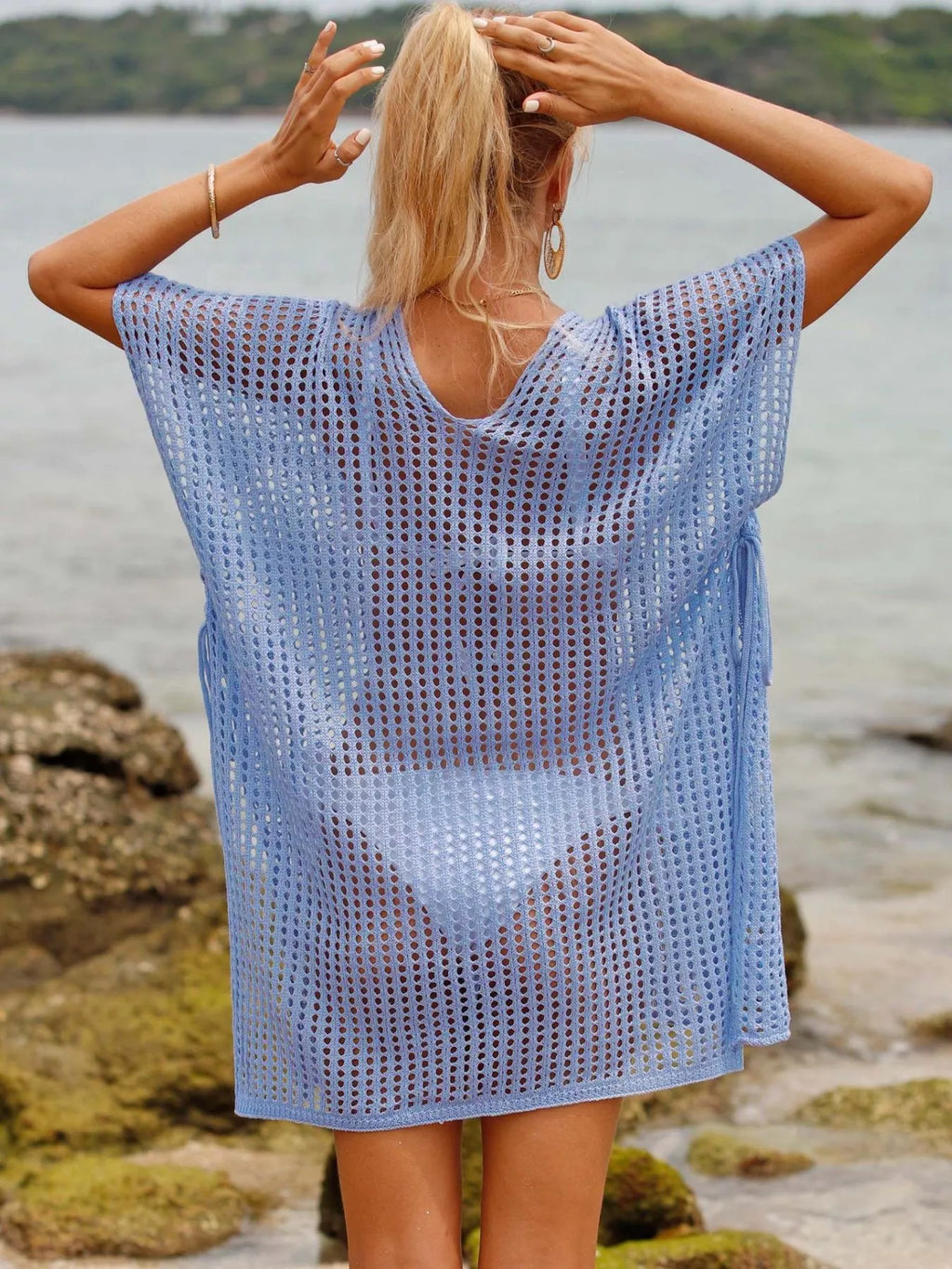 Openwork V-neck slit cover-up by Trendsi featuring a lightweight, airy design perfect for beach or poolside wear.