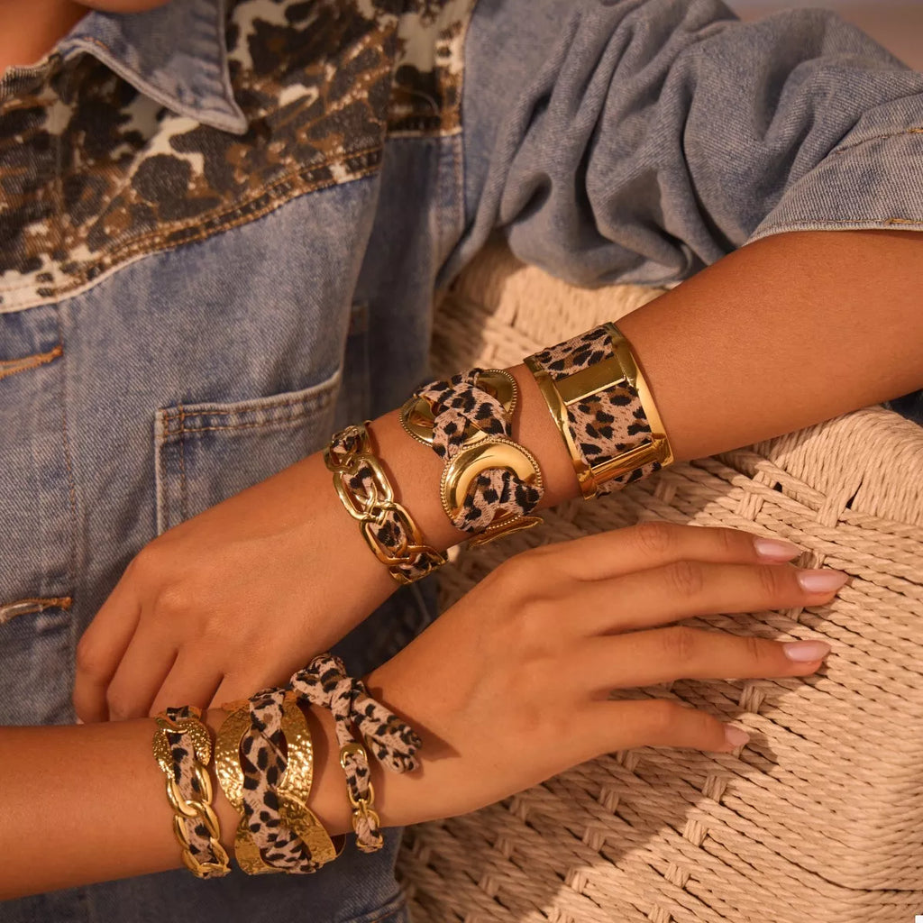 Leopard ribbon 18K gold-plated open bracelet by Shopimist featuring a sleek, stylish design with a leopard pattern detail.