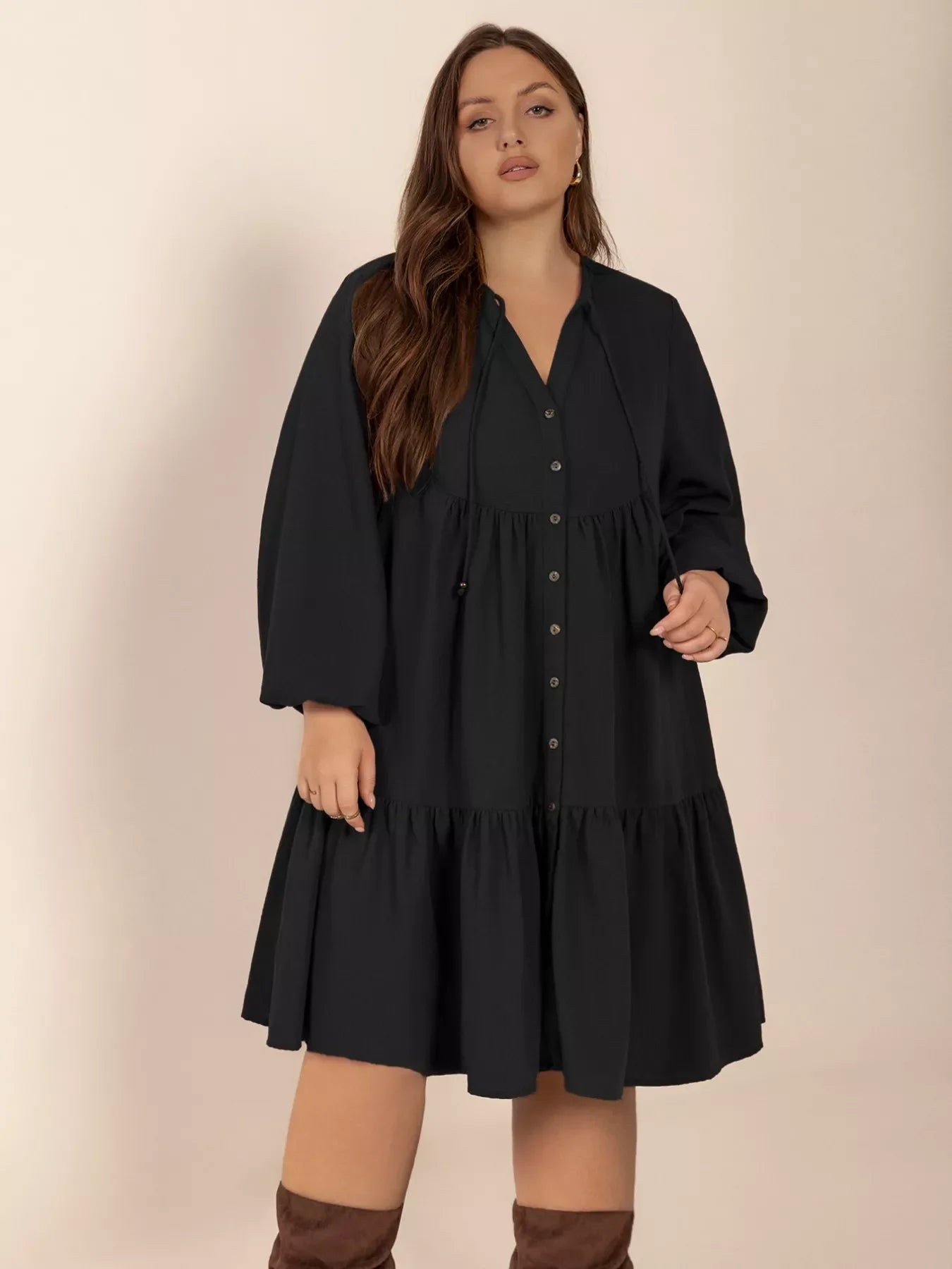 Plus size button-front balloon sleeve dress by Shopimist featuring a relaxed fit and stylish design, shown on a model.