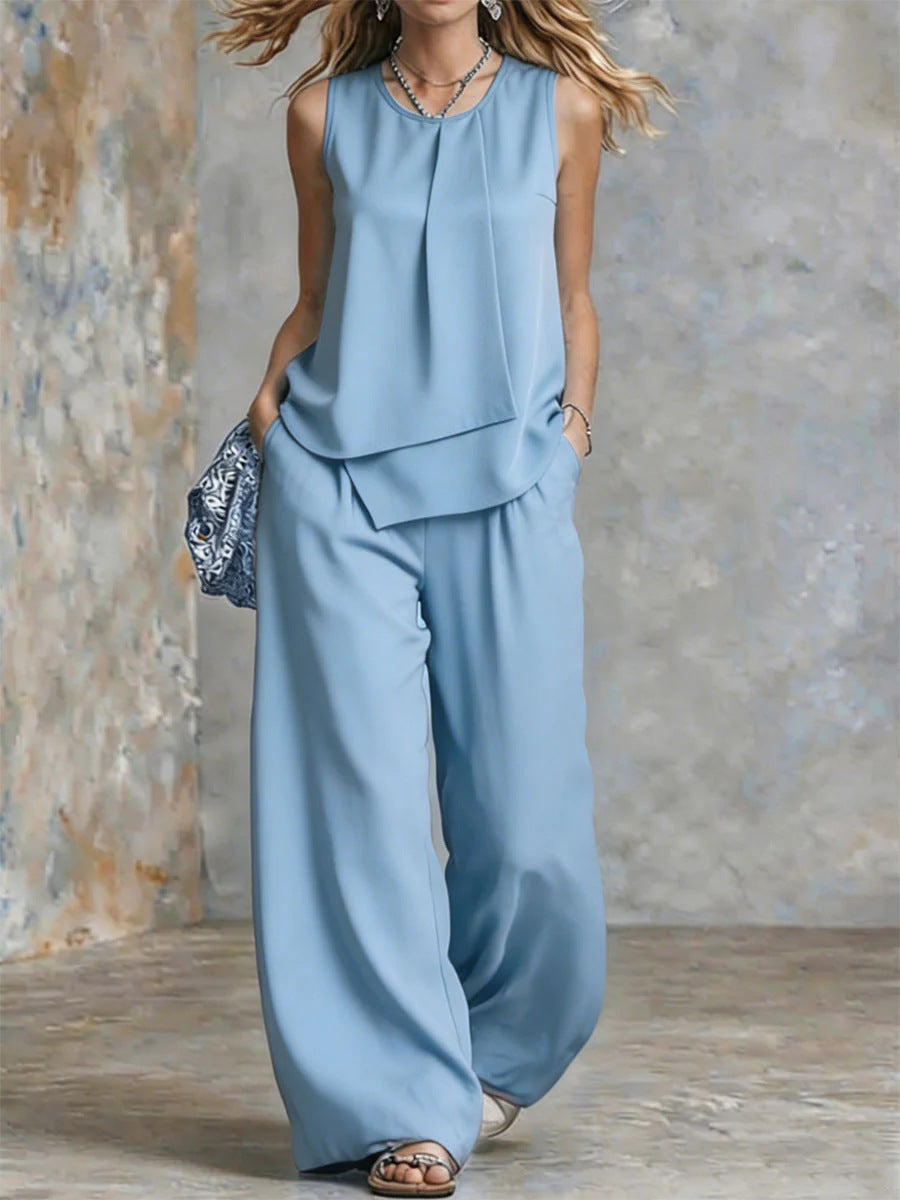 Women's sleeveless two-piece set with solid color wide-leg pants and top, stylish and comfortable from Plush Fashion Hub.