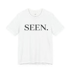 Black SEEN. Minimalist Tee by Wear Your Worship featuring simple design on classic black fabric.