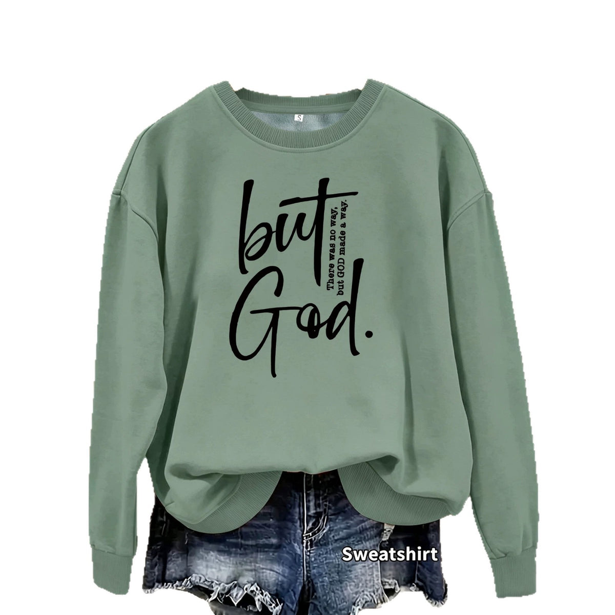 Sage green cotton sweatshirt with a crew neck and black graphic print reading "but God. There was no way, but GOD made a way."