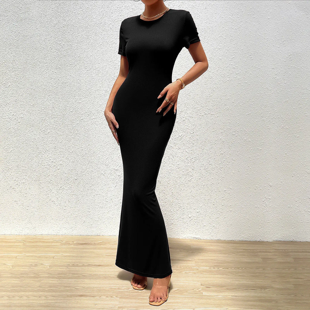 Elegant solid color slim fit round neck women's dress in a stylish design, perfect for a sophisticated look.