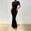 Elegant solid color slim fit round neck women's dress in a stylish design, perfect for a sophisticated look.