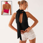 Women's lace-up back cutout sling top from Plush Fashion Hub, casualwear with low-cut back and stylish design.