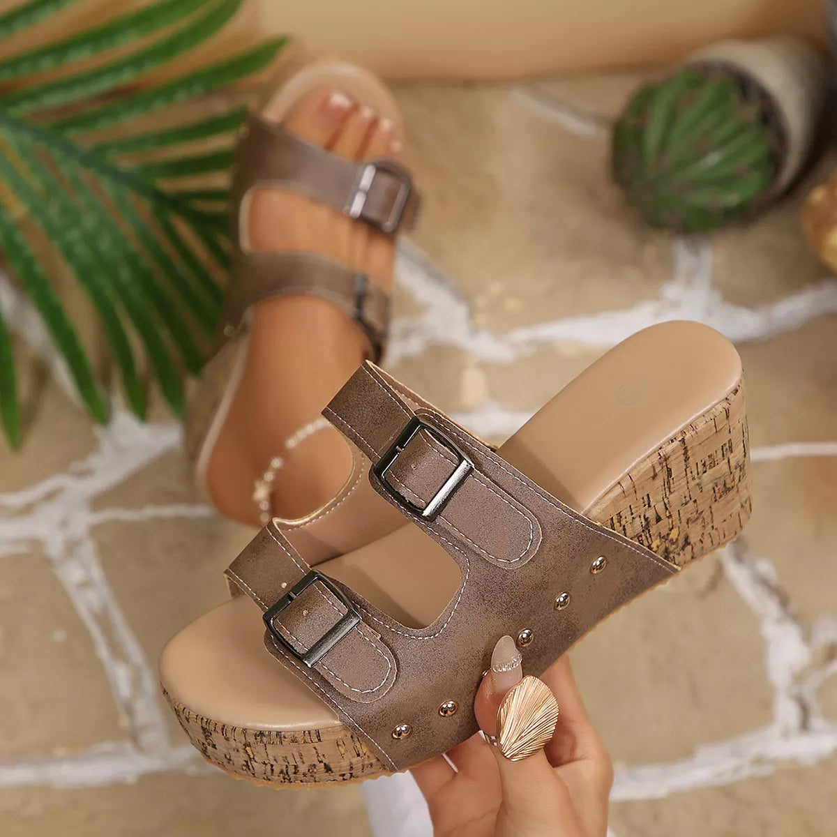 Open toe wedge sandals by Shopimist with tan leather straps and a cork wedge heel, perfect for summer footwear.